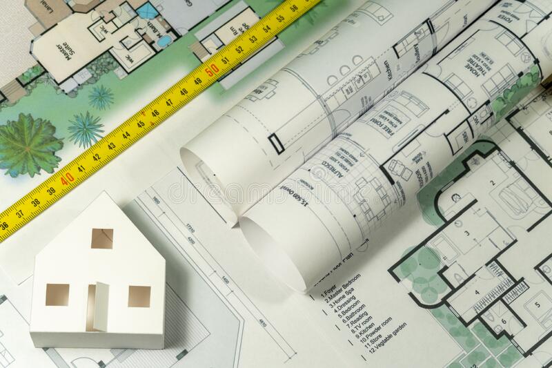 closeup-to-floor-plans-white-paper-house-measuring-yellow-tape-architect-drawings-expensive-renovation-building-construction-cost-177579461
